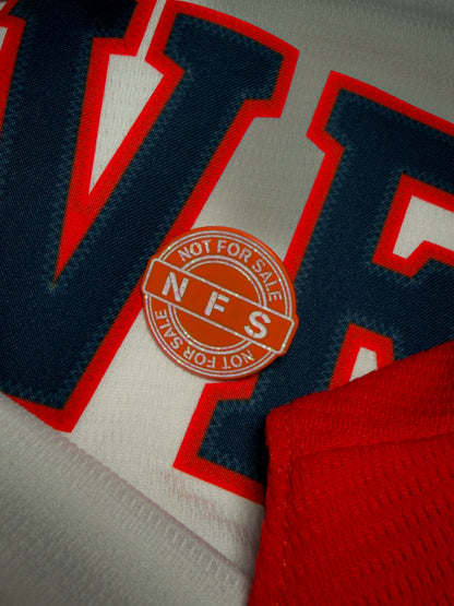 The NFS “Chase the fight” pin 🍊